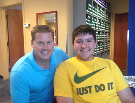 Dentist with a happy patient are smiling