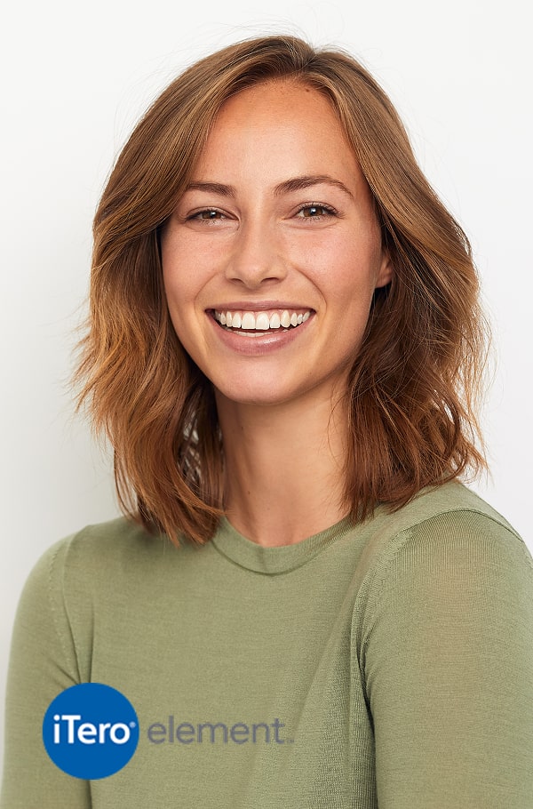 Advanced Scanning for Precision Orthodontics. A woman is smiling on a studio background