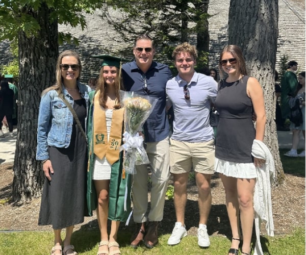 Beyond the Office – Get to Know Dr. Schulz & Family. Dr Scott Schulz smiling with his family